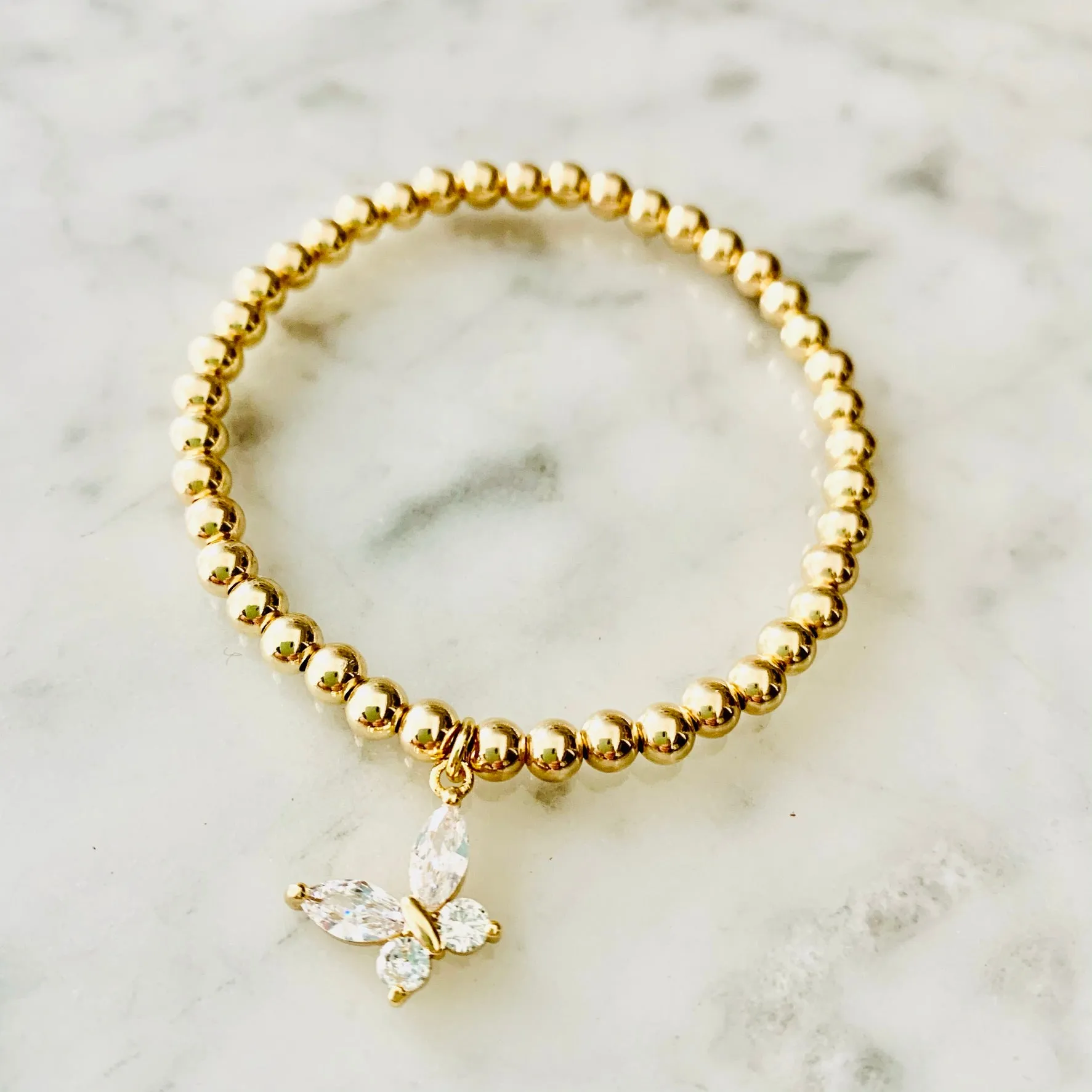 4mm YGF Beaded Stretch Bracelet with Crystal Butterfly Charm