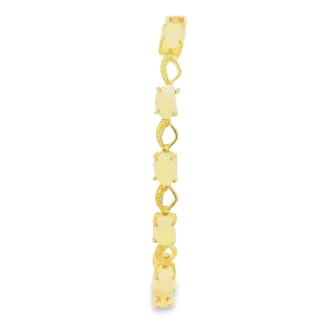 Gold Plated Sterling Silver patterned bracelet with 7x5mm White Opals