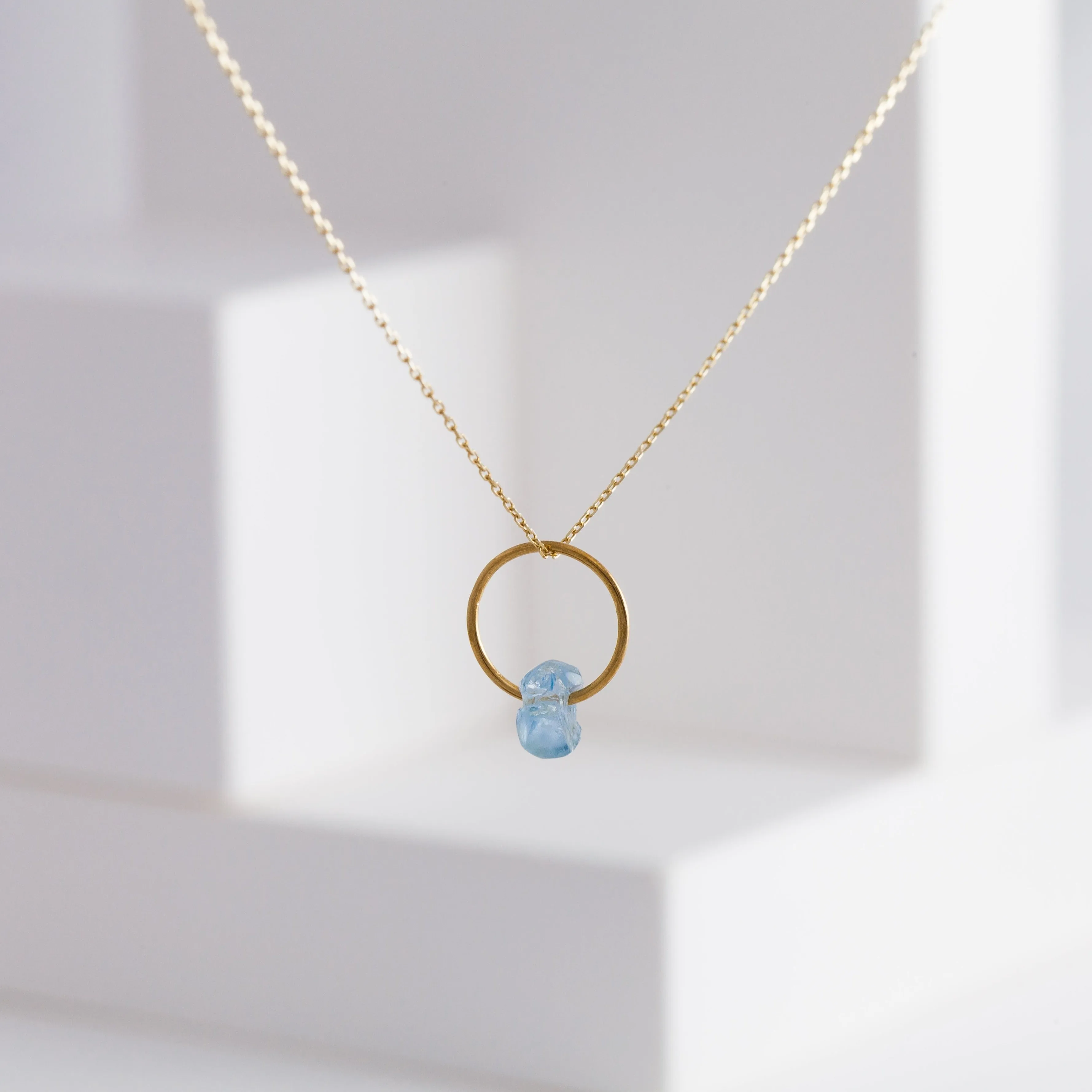 Rough stone aquamarine pendant