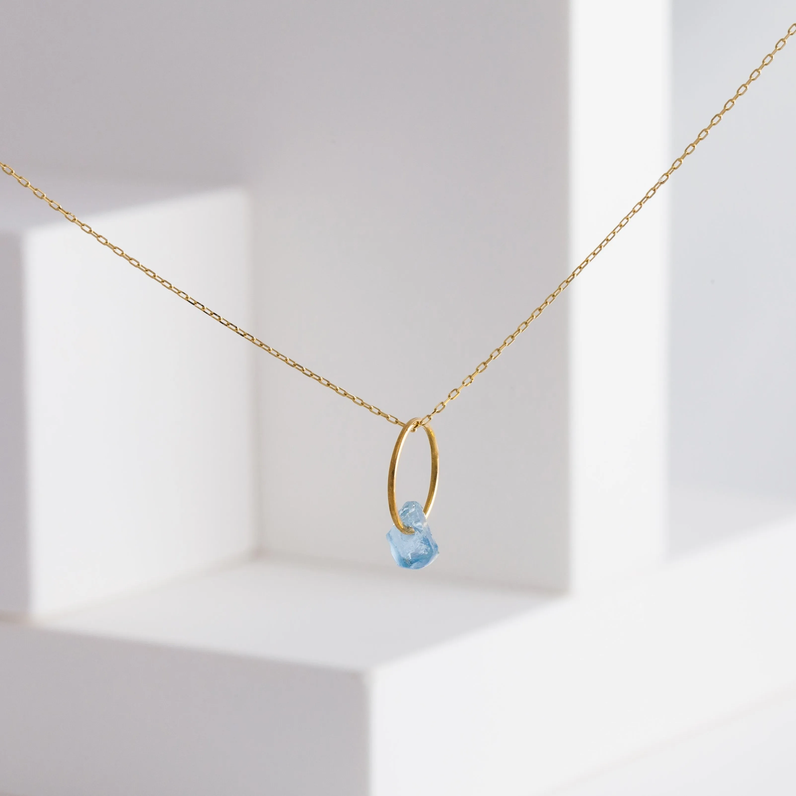 Rough stone aquamarine pendant